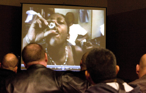 Paul Fraughton | The Salt Lake Tribune.
An audience made up of law enforcement  and other agencies  involved with gangs watch a video documentary dealing with female involvement in gangs on Wednesday.The video was part of a presentation, 