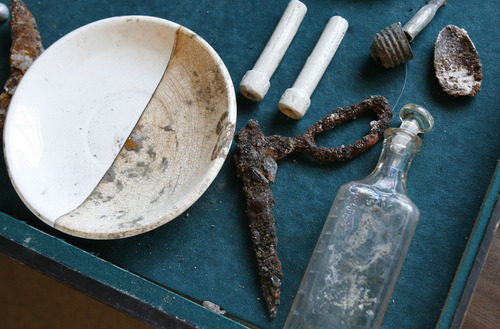 Francisco Kjolseth  |  The Salt Lake Tribune
Some of the artifacts that have been discovered by BYU archaeology students while working on the remains of the first Provo Tabernacle, are on display in a trailer near the site. Remains of the original building, which stood three stories tall and was completed in 1867, now sit below the surface adjacent to the current Tabernacle that burned in December of 2010.