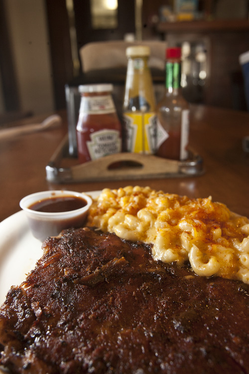 Leah Hogsten  |  The Salt Lake Tribune
Smedley Manor, a barbecue restaurant, in Bountiful, March 22, 2012. The 14-hour smoked ribs served with your choice of sauce and a side of your choice like baked macaroni and cheese.