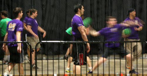 Steve Griffin  |  The Salt Lake Tribune

Dodgeball teams warm up during the Beehive Sport and Social Club adult league at The Complex in Salt Lake City on  Wednesday, March 14, 2012.