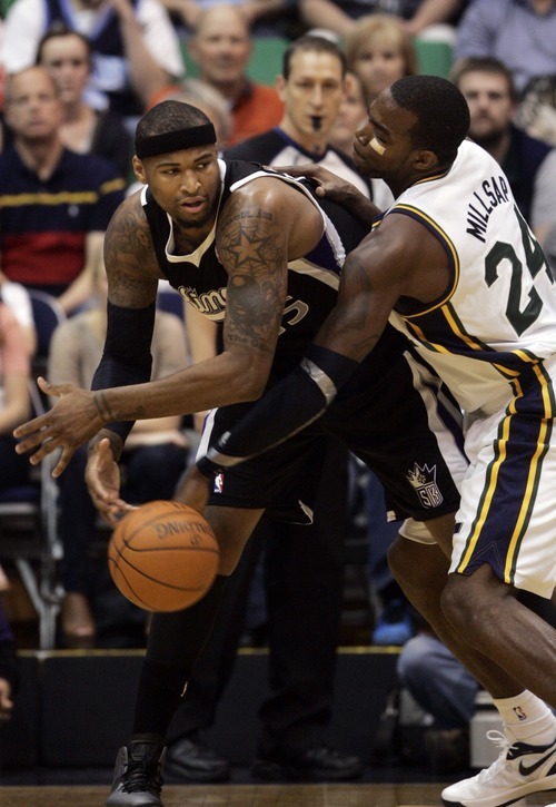 Kim Raff | The Salt Lake Tribune
Jazz player Paul Millsap creates a turnover as Kings player Demarcus Cousins tries to hang onto the ball during a game at EnergySolutions Arena in Salt Lake City, Utah on March 30, 2012.