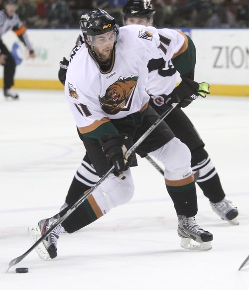 Rick Egan  | The Salt Lake Tribune 

The Grizzlies' John Armstrong (11) takes a shot, in ECHL action Grizzlies vs. The Las Vegas Wrangles, at the Maverick Center,  Monday, April 2, 2012.