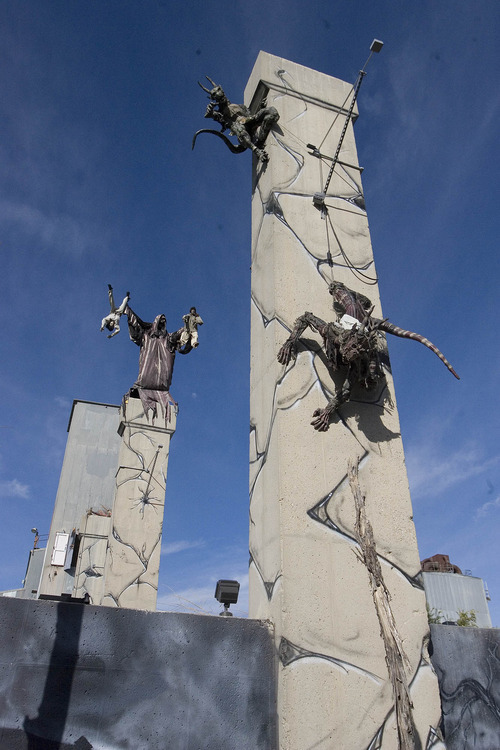 Paul Fraughton  |  The Salt Lake Tribune
The Grim Reaper and demonic figures grace the remains of an old cement plant at the Fear Factory, Salt Lake City's latest spook alley, opening for Easter weekend hauntings.