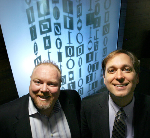 Steve Griffin  |  The Salt Lake Tribune

Fusion-io is a surging technology company, a leader in providing solid-state (chip-based) memory for servers in huge data centers. Here co-founders  Rick White and David Flynn are photographed in front of the binary code that spells out Fushion-io in the company's Cottonwood Heights, Utah  Monday, March 5, 2012. The company is only a few years old but has a market capitalization of more than $2 billion, which is pretty huge for Utah. Their drives are many times smaller than traditional disk drives and use a lot less power. They are selling to some of the biggest names in business.