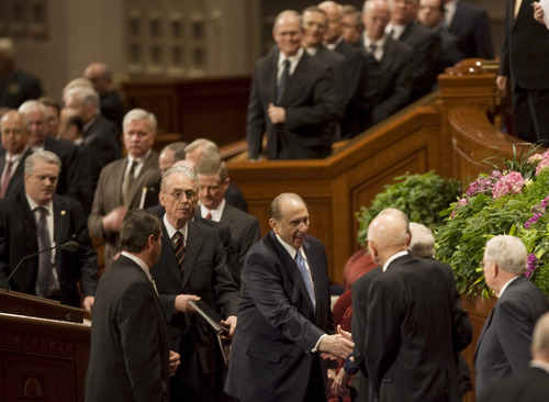 Kim Raff  |  The Salt Lake Tribune
LDS Church President Thomas S. Monson shakes hands as he leaves the morning session of the church's 182nd Annual General Conference in Salt Lake City on Sunday, April 1, 2012.