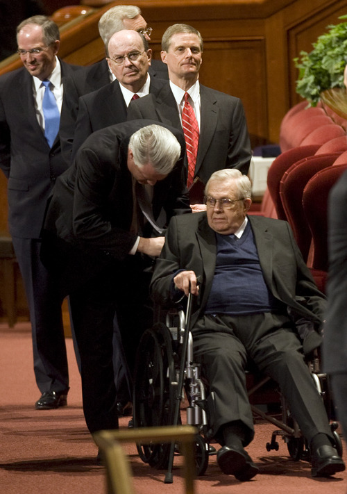 Kim Raff  |  The Salt Lake Tribune
Boyd K. Packer of the Quorum of the Twelve Apostles is helped out of the Conference Center after the morning session of the LDS Church's 182nd Annual General Conference in Salt Lake City on Sunday, April 1, 2012.
