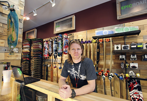 Lennie Mahler  |  The Salt Lake Tribune
Daniel Dapper, owner of Epic Boardshop, poses inside the new location at the Gateway Mall in Salt Lake City, Wednesday, April 4, 2012. The shop recently opened in a space previously occupied by Gymboree, which is now located at City Creek Center.