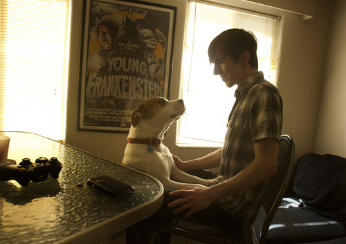 Leah Hogsten  |  The Salt Lake Tribune
James Wilson, above with his dog Clyde, April 4, 2012 ,  said his sister Stacy Wilson's decision to tell the Ogden Police Department about her former boyfriend Matthew David Stewart's marijuana growing operation was because she feared Stewart and believed he tried to break into her home after their relationship ended badly. Stewart is the suspect in the Ogden shooting that killed one police officer and wounded five others on Jan. 4, 2012.