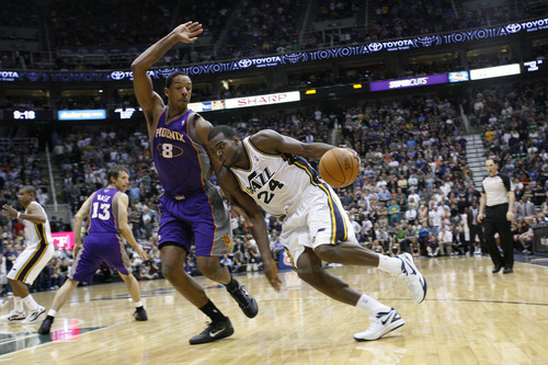 Chris Detrick  |  The Salt Lake Tribune
Utah Jazz power forward Paul Millsap (24) is guarded by Phoenix Suns center Channing Frye (8) during the second half of the game at EnergySolutions Arena Wednesday April 4, 2012. Phoenix won the game 107-105.