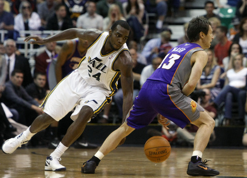Chris Detrick  |  The Salt Lake Tribune
Utah Jazz power forward Paul Millsap (24) steals the ball from Phoenix Suns point guard Steve Nash (13) during the second half of the game at EnergySolutions Arena Wednesday April 4, 2012. Phoenix won the game 107-105.