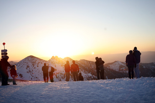Kim Raff  |  The Salt Lake Tribune
People watch the sunrise during an Easter service on top of Hidden Peak at Snowbird Ski Resort on Sunday, April 8, 2012.