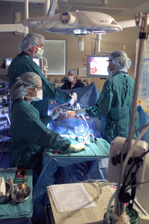 Al Hartmann  |  The Salt Lake Tribune
Surgical team at St. Mark's Hospital performs laparoscopic gastric bypass on Darren King. A growing body of research suggests this surgery can reverse diabetes.