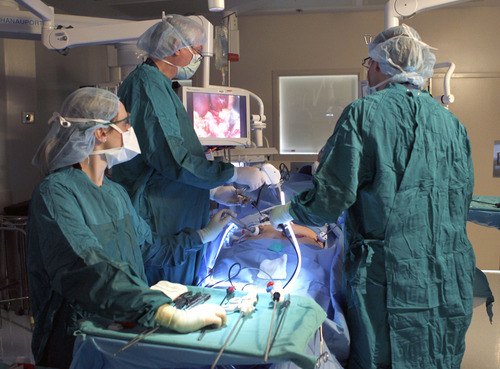 Al Hartmann  |  The Salt Lake Tribune
Surgical team at St. Mark's Hospital performs laparoscopic gastric bypass on Darren King. A growing body of research suggests this surgery can reverse people's diabetes.