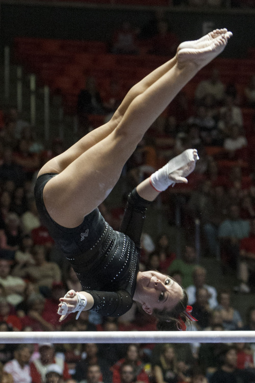 Chris Detrick  |  The Salt Lake Tribune
Utah's Stephanie McAllister competes on the bars during the NCAA gymnastics Regionals at the Huntsman Center Saturday April 7, 2012. Utah won the meet with a score of 196.8250 and will compete in the national championship April 20-22 in Duluth, Georgia.