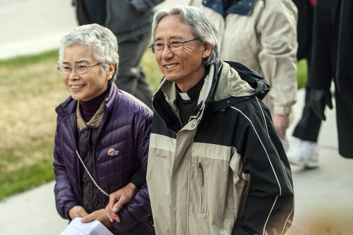 Chris Detrick  |  The Salt Lake Tribune
First United Methodist Church Pastor Eun-sang Lee and his wife, Yvonne Lee, Pastor at Centenary United Methodist Church, participate in the Good Friday Procession of the Cross Friday, April 6, 2012.