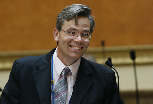 Scott Sommerdorf  |  The Salt Lake Tribune             
Representative Kenneth Sumsion (R; American Fork) speaks on the House floor during the special session of the Utah Legislature to consider redistricting, Monday, October 3, 2011.