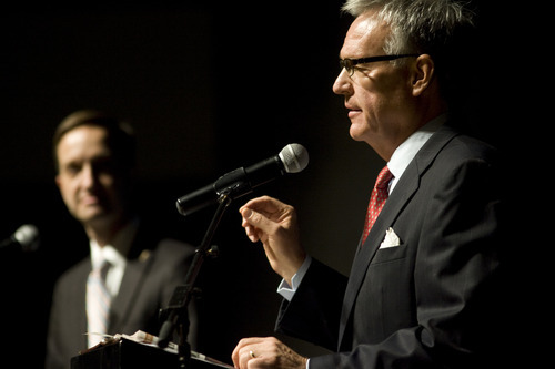 Kim Raff | The Salt Lake Tribune
(left) Pete Ashdown listens as Scott Howell answers a question during the Democratic debate for U.S. Senate at Juan Diego Catholic High School auditorium in Draper, Utah on April 11, 2012.