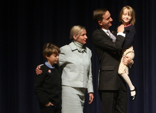 Kim Raff | The Salt Lake Tribune
Pete Ashdown stands with his family on stage after participating in a Democratic debate for U.S. Senate with Scott Howell at Juan Diego Catholic High School auditorium in Draper, Utah on April 11, 2012.