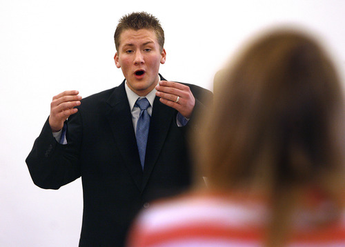 Scott Sommerdorf  |  The Salt Lake Tribune             
Tyler DeBruin of Westlake High debates in front of Judge Madeline Dailey as he competes in the 4A state debate championships. Students compete in the Policy debate and Lincoln-Douglas style debates, Saturday, March 10, 2012.