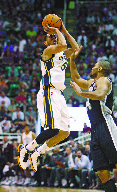 Steve Griffin/The Salt Lake Tribune


Utah's Devin Harris rises for a three pointer against the San Antonio Spurs at EnergySolutions Arena in Salt Lake City Monday April 9, 2012. Harris had a huge fourth courter leading the Jazz to victory.