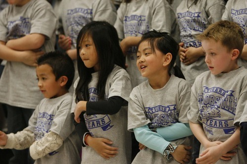 Rick Egan  | The Salt Lake Tribune 

Second-grade students do the Macarena as part of the festivities to commemorate Taylorsville Elementary School's 50th birthday, Thursday, March 29, 2012.