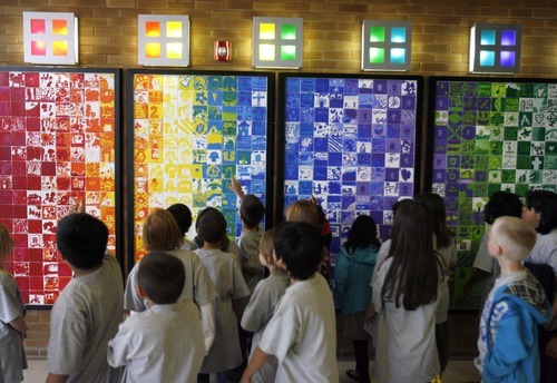 Rick Egan  | The Salt Lake Tribune 

Each student painted a tile to make up a mural to commemorate Taylorsville Elementary School's 50th birthday, Thursday, March 29, 2012.