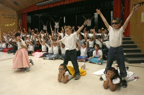 Rick Egan  | The Salt Lake Tribune 

Fifth-grade students dance to 