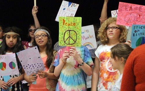 Rick Egan  | The Salt Lake Tribune 

Fourth-grade students sing the Monkees' 