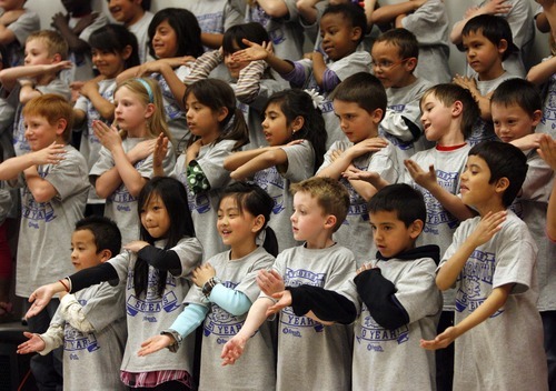 Rick Egan  | The Salt Lake Tribune 

Second-grade students do the Macarena as part of the festivities to commemorate Taylorsville Elementary School's 50th birthday, Thursday, March 29, 2012.