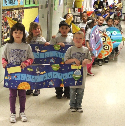 Rick Egan  | The Salt Lake Tribune 

Kindergarten students took part in the festivities to commemorate Taylorsville Elementary School's 50th birthday, Thursday, March 29, 2012.