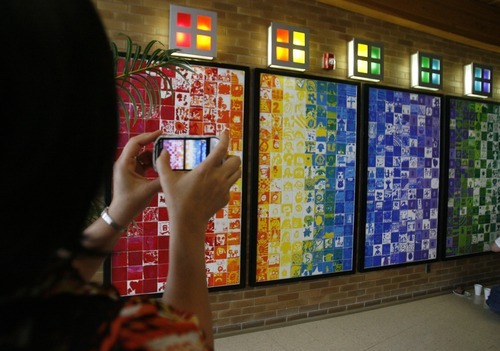 Rick Egan  | The Salt Lake Tribune 

Each student painted a tile to make up a mural to commemorate Taylorsville Elementary School's 50th birthday, Thursday, March 29, 2012.