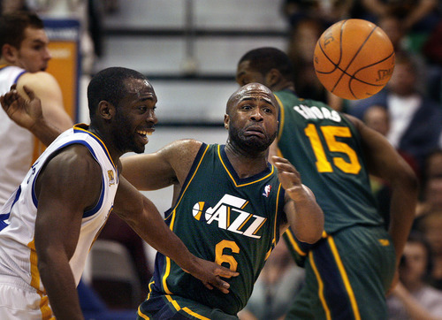 Scott Sommerdorf  |  The Salt Lake Tribune             
Jamaal Tinsley of the Jazz scrambles for this loose ball  during fourth quarter play. The Utah Jazz defeated the Golden State Warriors 99-92 in OT at Energy Solutions Arena, Saturday, March 17, 2012.