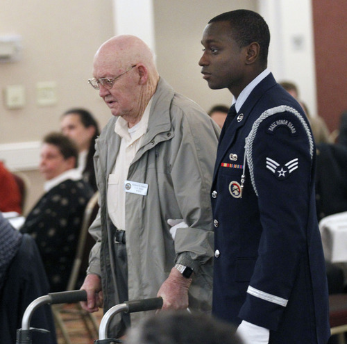 Al Hartmann  |  The Salt Lake Tribune
World War II U.S. Army Air Corp. POW Richard Hansen is escorted by Hill Air Force base honor guard for recognition during a Prisoner of War appreciation luncheon Friday, April 13.