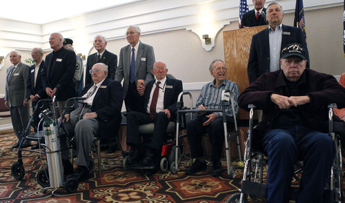 Al Hartmann  |  The Salt Lake Tribune
Utah POWs take the stand to be recognized during a Prisoner of War appreciation luncheon Friday, April 13.