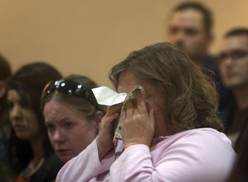 Kim Raff  |  The Salt Lake Tribune
Christina Burak, a Matthew David Stewart supporter, becomes emotional on Thursday during a meeting the family held at the Weber County Library to decry violent drug raids.