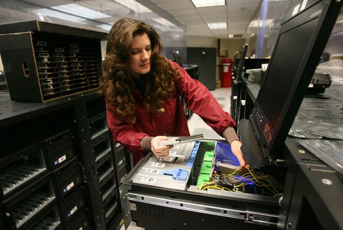 Steve Griffin  |  The Salt Lake Tribune
Fusion-io quality assurance analyst  Jamie Taylor checks drives in the Nucleon lab at Fusion-io's offices in Cottonwood Heights March 8, 2012. The American Legislative Exchange Council said Utah's nonfarm employment in such sectors as transportation, high-tech, manufacturing and tourism grew 11.3, fifth-fastest in the U.S.