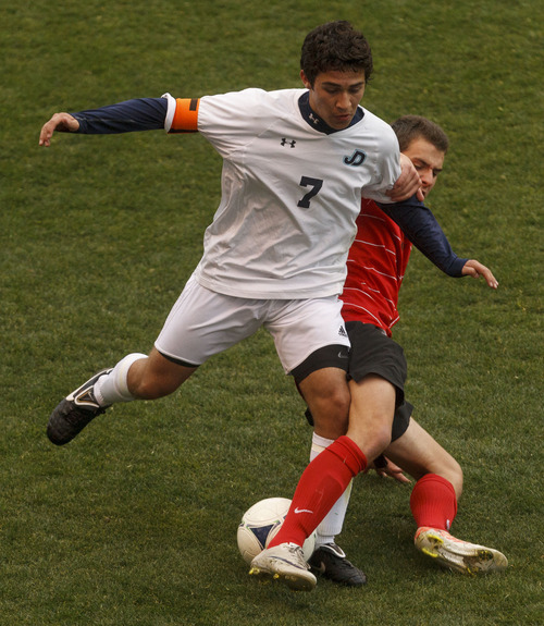Trent Nelson  |  The Salt Lake Tribune
Juan Diego's Emmanuel Hurtado, left, is brought down by Alta's Steven Johnson. Alta vs. Juan Diego, competing in the Real Cup High School Soccer Tournament at Rio Tinto Stadium Saturday, April 14, 2012 in Salt Lake City, Utah.