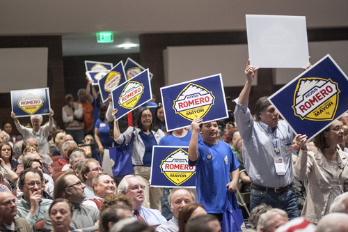 Chris Detrick  |  The Salt Lake Tribune
Supporters of Salt Lake County mayor candidate Ross Romero wave signs during the Salt Lake County Democratic Party Nominating Convention at Murray High School Saturday April 14, 2012.