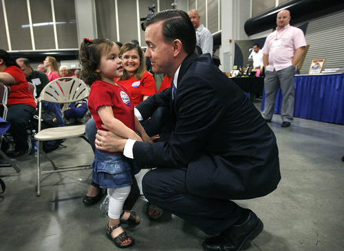 Scott Sommerdorf  |  The Salt Lake Tribune             
Mike Winder, candidate for Salt Lake County mayor, stops by to talk with his 4-year-old daughter Grace prior to speaking during the GOP Convention, Saturday, April 14, 2012. Salt Lake County Republicans gathered to select candidates for county posts.