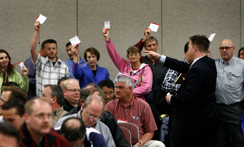 Scott Sommerdorf  |  The Salt Lake Tribune             
Delegates vote, and are counted during a vote on an agenda item during the GOP convention, Saturday, April 14, 2012. Salt Lake County Republicans gathered to select candidates for county posts.