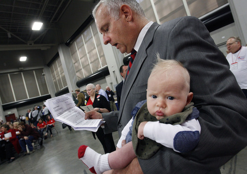 Scott Sommerdorf  |  The Salt Lake Tribune             
Richard Snelgrove, candidate for Salt Lake County mayor, rehearses his speach with his grandson Hank in his arms during the GOP Convention, Saturday, April 14, 2012. Salt Lake County Republicans gathered to select candidates for county posts.