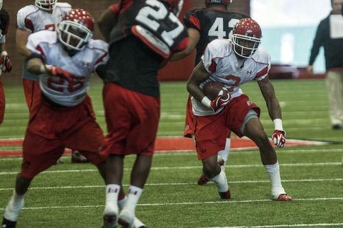 Chris Detrick  |  The Salt Lake Tribune
Utah Utes wide receiver Kenneth Scott (2) runs the ball during a practice at the Spence Eccles Field House Thursday April 12, 2012.