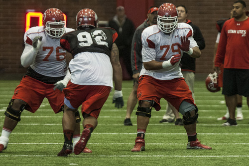 Chris Detrick  |  The Salt Lake Tribune
Utah Utes offensive linesman Percy Taumoelau (79) during a practice at the Spence Eccles Field House Thursday April 12, 2012.