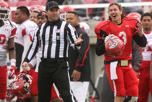 Leah Hogsten  |  The Salt Lake Tribune
Utes quarterback Jordan Wynn laughingly questions a call from referees. University of Utah football team held their Spring red and white scrimmage Saturday, April 14 2012 in Salt Lake City at Rice Eccles Stadium.