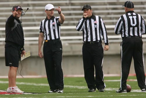 Leah Hogsten  |  The Salt Lake Tribune
Head Coach Kyle Whittingham questions the referees. University of Utah football team held their Spring red and white scrimmage Saturday, April 14 2012 in Salt Lake City at Rice Eccles Stadium.