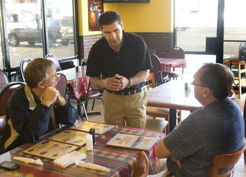 Paul Fraughton | The Salt Lake Tribune
Marcarios Diaz, the owner of El Rocoto in West Valley City, explains items on the Peruvian restaurant's menu. El Rocoto reflects the diversity of Peruvian dining with a broad menu of some 70 items (not counting desserts, drinks or side orders), including several dishes suitable as appetizers, with helpings generous enough to share.