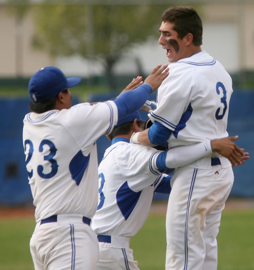 Steve Griffin/The Salt Lake Tribune


Bingham's Brady Lail jumps into the arms of his teammates after driving in the game winning run in the bottom of the seventh during game between against American Fork at Bingham High School in South Jordan, Utah Wednesday April 18, 2012.
