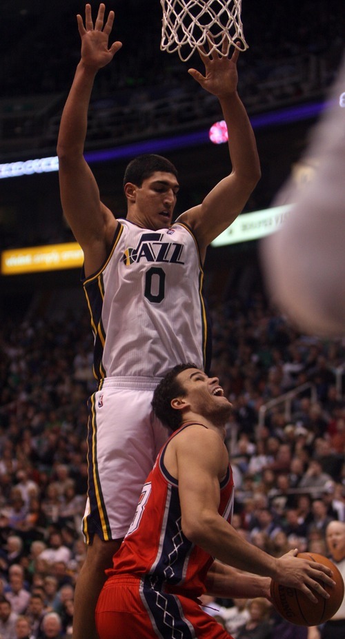 Kim Raff |The Salt Lake Tribune
Utah Jazz player Enes Kanter defends New Jersey Nets player Kris Humphries under the basket during the second half at Energy Solutions Arena in Salt Lake City, Utah on January 14, 2012.    The Jazz went on to win 107-94.