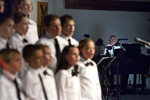 Paul Fraughton | The Salt Lake Tribune.
The Clearfield Children's Choir performs at  the Community Choir's Spring concert at The Clearfield Community Church.Clearfield's mayor, Don Wood plays the piano for the performers.
 Monday, April 16, 2012
