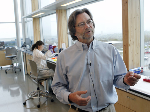Al Hartmann  |  The Salt Lake Tribune
USTAR analytical chemistry professor Marc Porter describes the interdisplinary approach to research that takes place in the James L. Sorenson Molecular Biotechnology Building, the University of Utah's new $130 million USTAR facility.